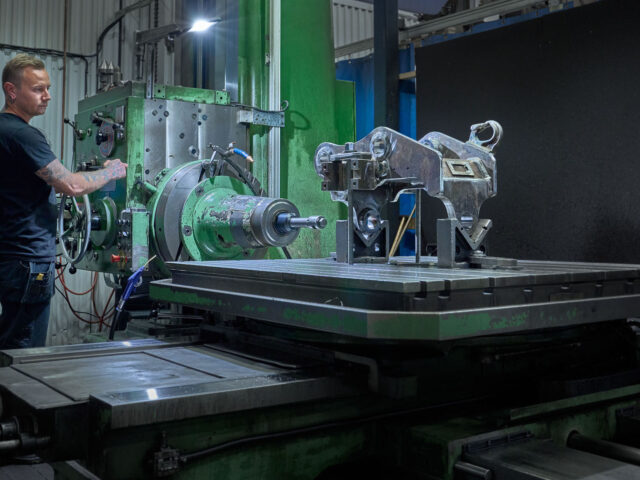 production facility showing manufacturing of quick couplers for excavators in sweden